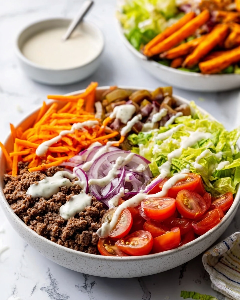 A close-up view of a white bowl filled with a colorful layered salad on a white marbled surface. The bowl is divided into sections showing layers of shredded orange carrots on the left, cooked brown minced meat next to it, green shredded lettuce on the right, halved red cherry tomatoes nearby, all topped with slices of red onion and a drizzle of creamy white dressing over the layers. In the background, there is another white bowl with more salad and some sweet potato fries, along with a small white bowl of dressing. Photo taken with an iphone --ar 4:5 --v 7