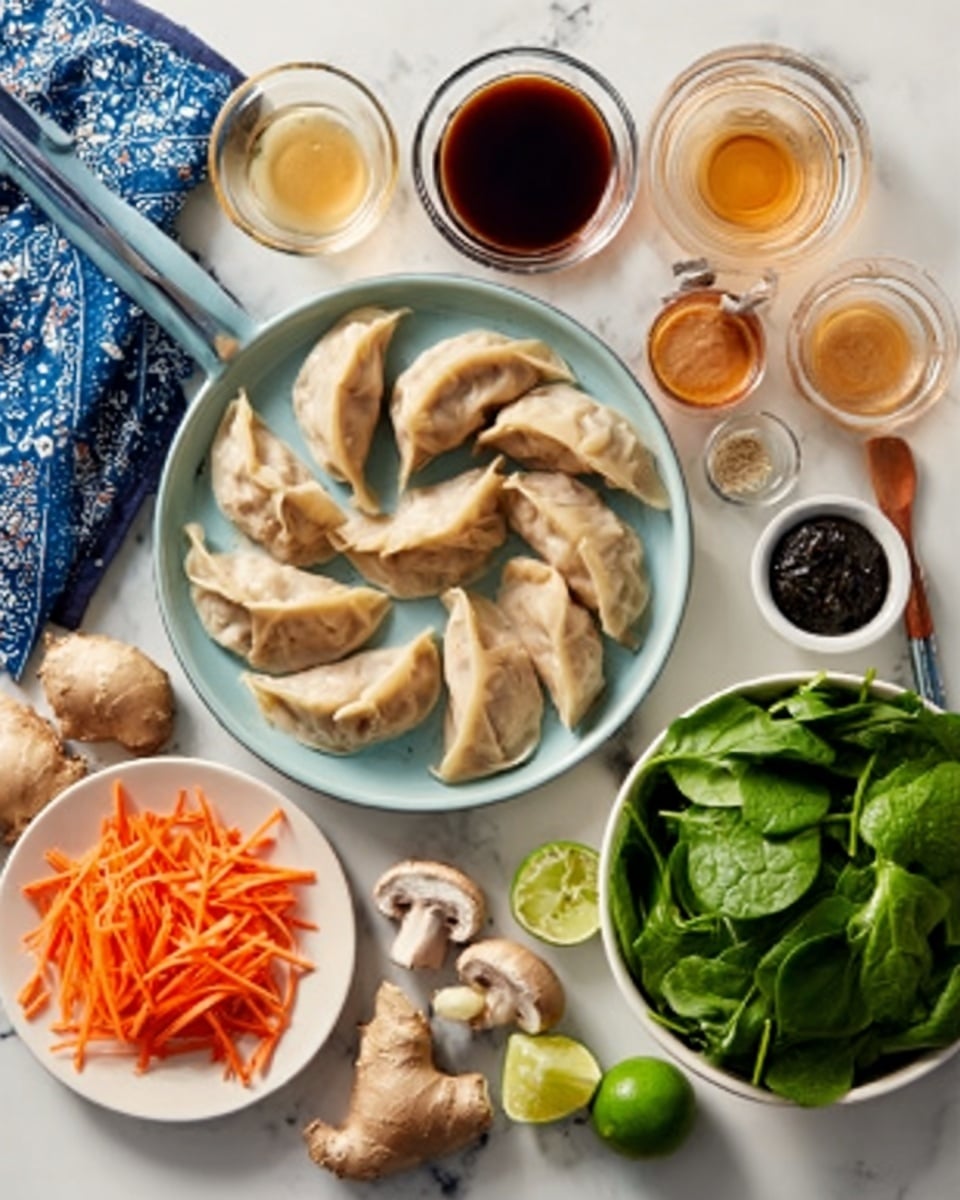 A white plate holds six crescent-shaped dumplings that are lightly browned with a soft texture, arranged neatly in a circle. To the right, a bowl of fresh green leafy spinach leaves is visible. Above the plate, there are various small glass bowls containing a translucent amber liquid, dark brown sauce, and a thick black paste. On the left side, a white plate contains thin orange carrot strips piled in a small mound. Several small mushrooms, lime halves, and a small piece of ginger are scattered around the table. A blue kitchen towel with a white pattern is draped near the top left. The whole setting rests on a white marbled surface. photo taken with an iphone --ar 4:5 --v 7