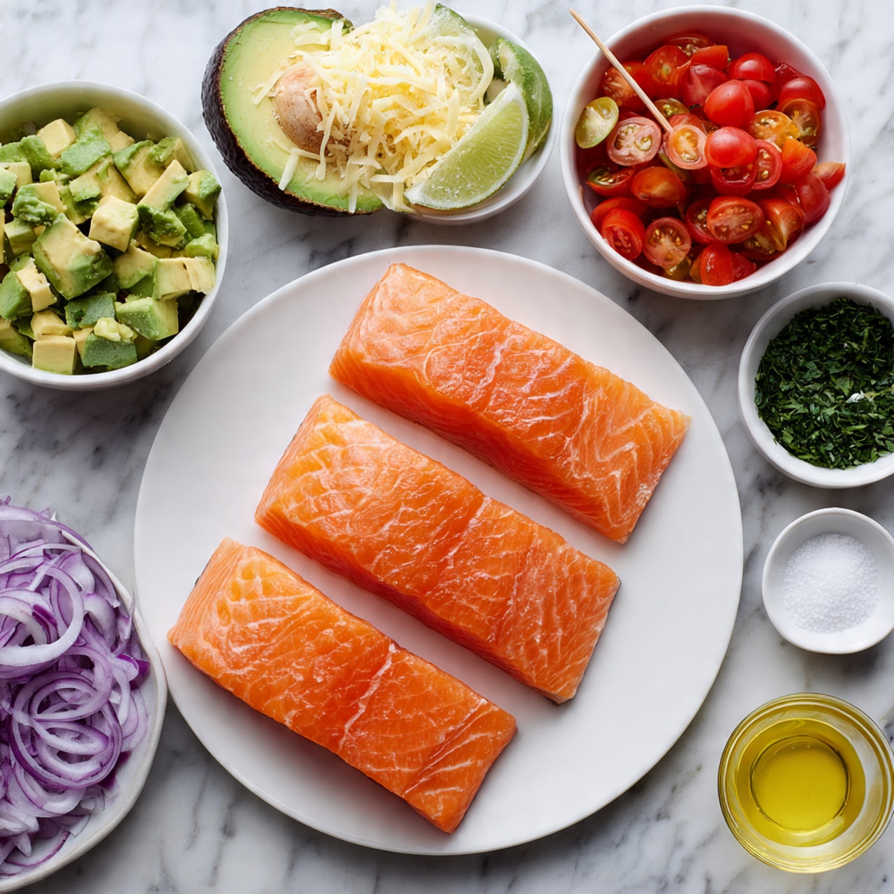 A white plate holds three raw salmon fillets with a bright orange color and smooth texture. Around the plate, small white bowls show different ingredients: one bowl with chopped avocado pieces in green shades, another with sliced red cherry tomatoes, a bowl with light yellow grated cheese, a bowl of chopped green herbs, a bowl of sliced purple onions, a bowl of light yellow liquid, and a small bowl of salt. A halved avocado and a halved lime are placed on the white marbled surface nearby. A woman's hand is holding a toothpick near the avocado bowl. Photo taken with an iphone --ar 4:5 --v 7