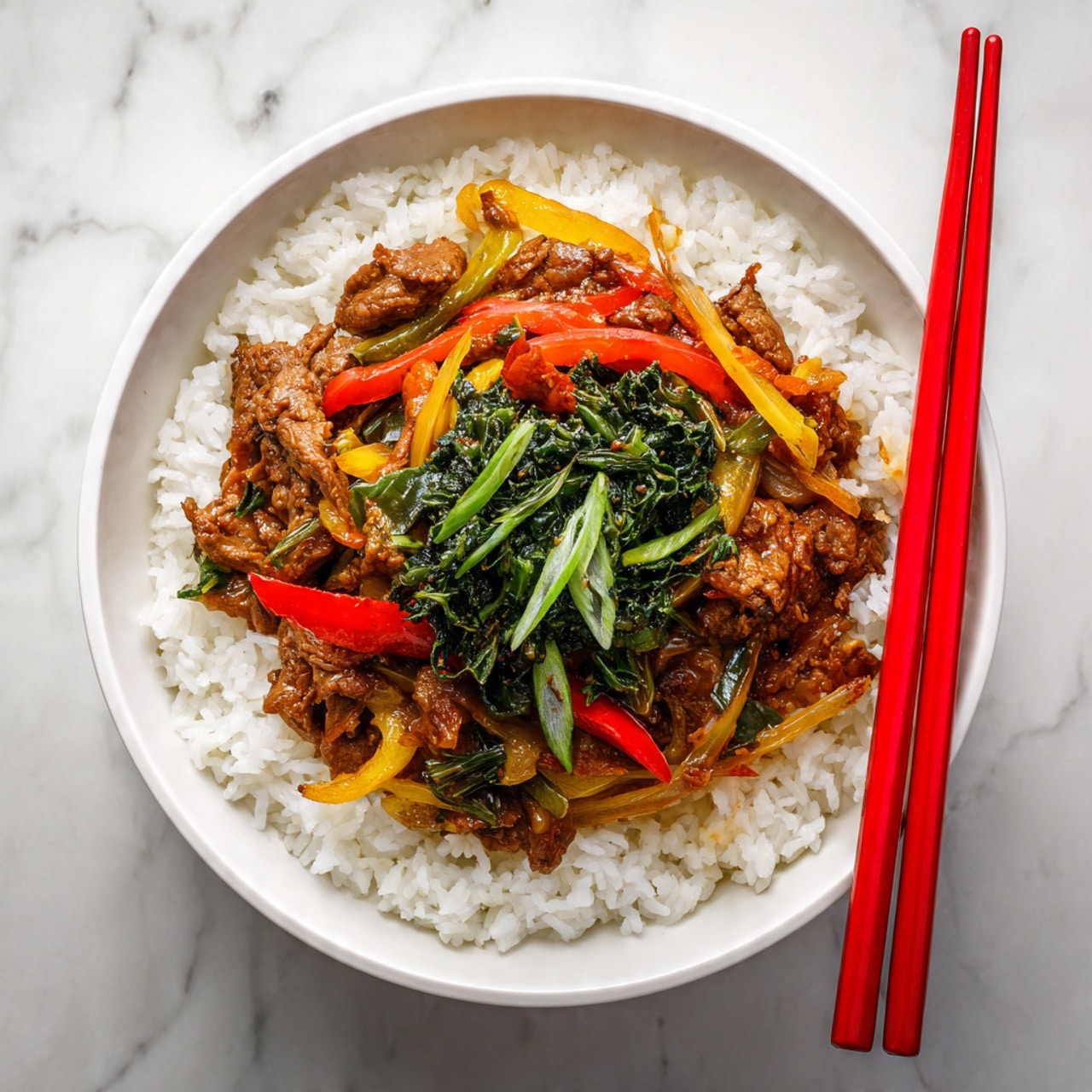 A white bowl holds a layer of soft white rice at the bottom, topped with a mix of brown cooked meat and light yellow cooked vegetables, with a small bunch of dark green leafy vegetables placed on top in the center. The bowl is on a white marbled surface with a pair of red chopsticks resting across the bowl's rim. The colors contrast warmly, with the white rice bright and fluffy, the meat and vegetables mixed in a rich sauce, and the green leaves adding a fresh touch. photo taken with an iphone --ar 4:5 --v 7