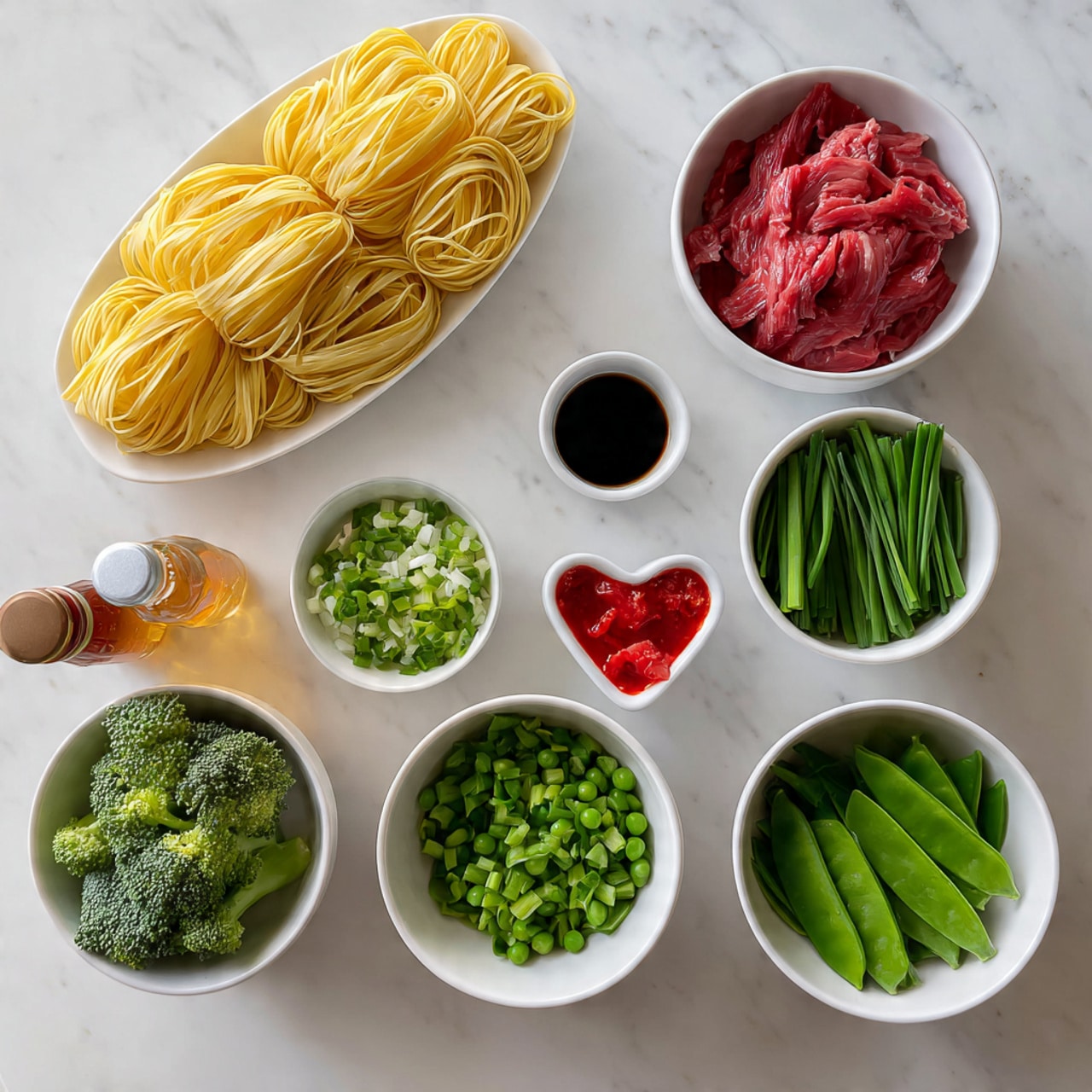 The image shows several white bowls and a white plate with different ingredients arranged neatly on a white marbled surface. The white plate holds a bundle of yellow noodles twisted into an oval shape at the top left. Surrounding it are white bowls containing thin slices of red raw meat, bright green snap peas, light green chopped scallions, and fresh green broccoli. There is a small white bowl with a red sauce shaped like a heart near the center and three bottles of sauces and honey placed on the left side. The items are evenly spaced, creating a clean and fresh look. Photo taken with an iphone --ar 4:5 --v 7