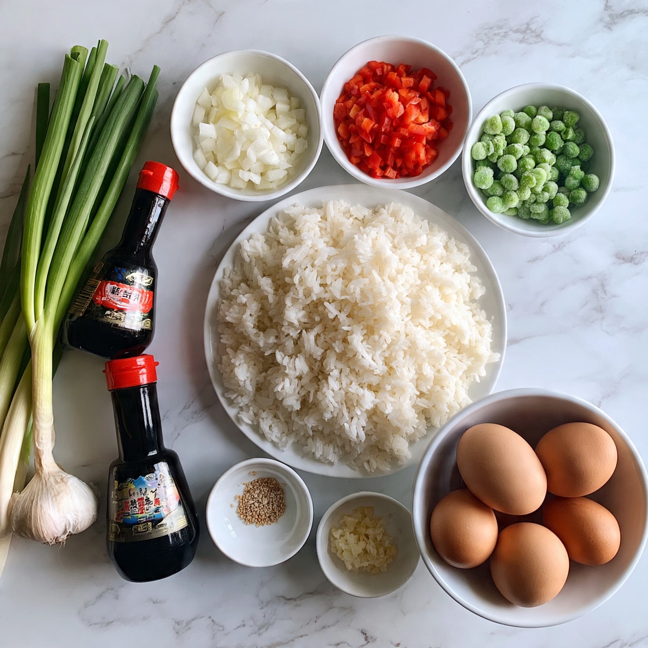 square image The image shows ingredients laid out on a wooden surface, including spring onions and a garlic bulb on the left, three small white bowls with diced onions, chopped red peppers, and frozen green peas arranged in a row on the top right. Below these bowls, there is a large white plate filled with fluffy white rice, a white bowl with four brown eggs on the bottom right, and small white dishes containing seasonings and minced garlic placed near the center. Two bottles of dark soy sauce and sesame oil lie horizontally on the left side of the image. The surface is wooden but should be imagined as a white marbled texture. Photo taken with an iphone --ar 4:5 --v 7