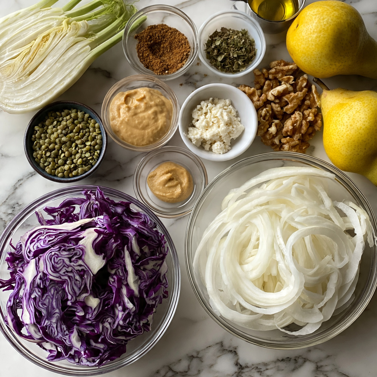 Roasted Red Cabbage with Caramelized Edges and Herbs Recipe 4 square image The image shows an array of fresh ingredients arranged neatly on a white marbled surface. In the bottom left corner, there is a clear glass bowl filled with thinly sliced purple cabbage, showing deep purple and white veins. To the right, a larger glass bowl holds thin white onion rings stacked loosely. Above these, a series of small glass and white bowls present additional ingredients: green lentils in a dark bowl, a small bowl of creamy beige peanut butter, and another with crumbled white cheese. There are also small bowls containing brown spice powder, chopped green herbs, and whole walnut pieces. On the top right, a bright yellow pear rests near a small measuring cup with golden oil. At the top left, a halved fennel bulb displays its pale white layers with green stalks extending. Each ingredient is separated clearly, showcasing a colorful, fresh, and natural setup. Photo taken with an iphone --ar 4:5 --v 7