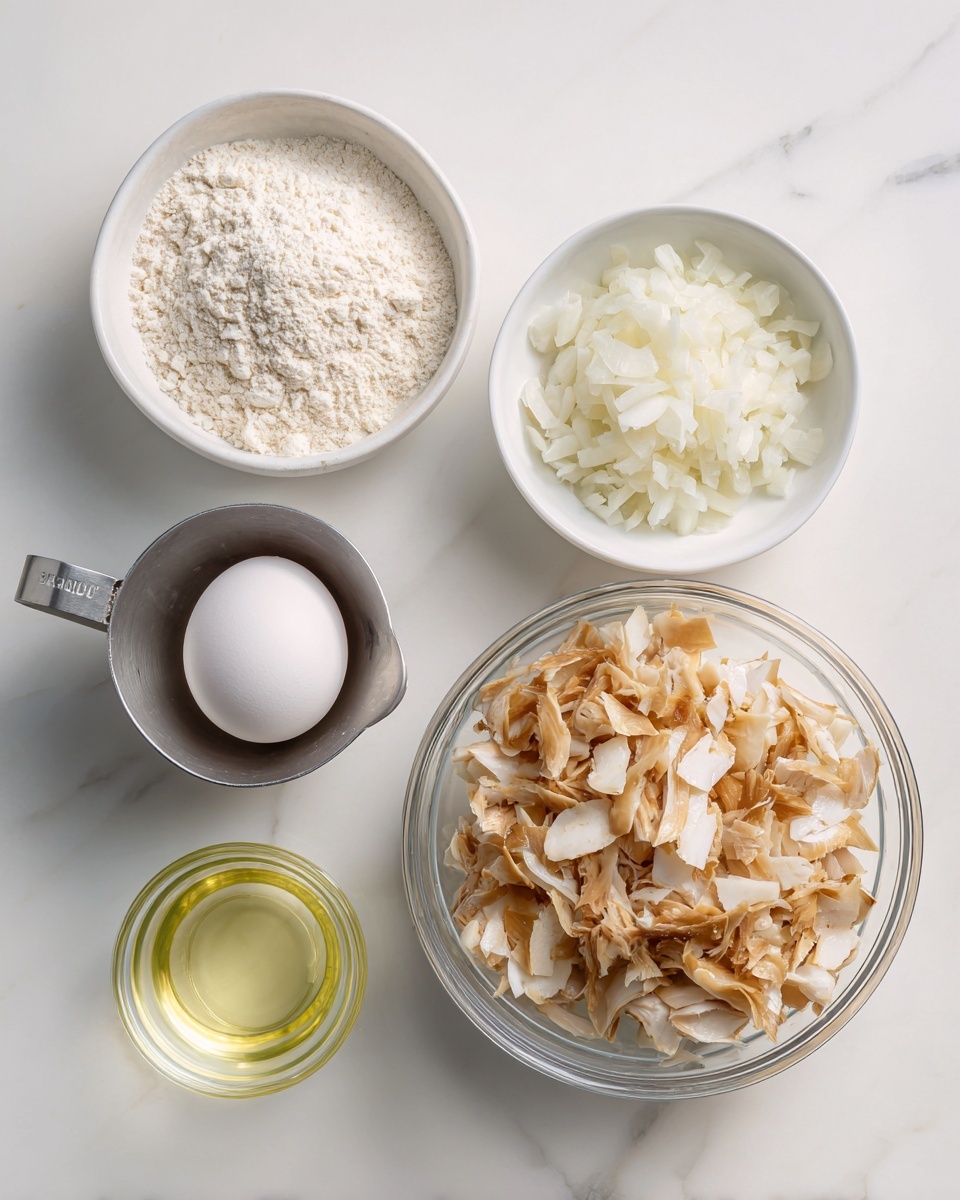 square image The image shows five ingredients neatly arranged on a white marbled surface: a clear glass bowl on the right filled with shredded, light brown and white pieces, likely chicken; a small white bowl above containing finely chopped white onions; a single white egg resting in a small clear glass bowl to the left of the onions; a silver measuring cup below the egg filled with white flour; and a clear measuring cup filled with a pale yellow liquid, possibly oil, placed below the onions and next to the flour. All items are evenly spaced with a clean and simple presentation. Photo taken with an iphone --ar 4:5 --v 7