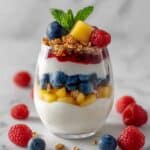 Summer Fruit Parfait with Greek Yogurt, Fresh Berries, Peaches, and Granola Recipe