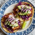 Fish Tacos with Cabbage Slaw and Lime-Infused Creamy Sauce Recipe