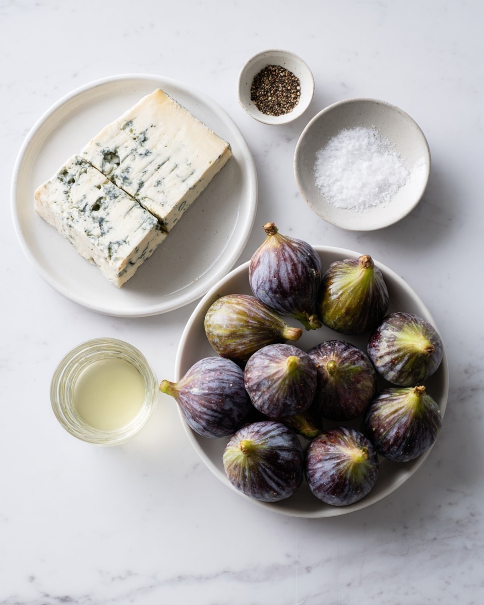 Fig and Blue Cheese Bites Recipe 4 The image shows a white plate filled with about thirteen fresh figs, all whole and arranged with their stems facing up or to the side. To the left, there is a smaller white plate with a large piece of blue-veined cheese that has a creamy color with blue streaks inside and two thin cuts on top. Above the cheese plate are two small white bowls, one containing coarse ground black pepper and the other with white coarse salt. Below the cheese plate is a small glass cup filled with a clear light yellow liquid. All items are placed on a white marbled surface, creating a clean and simple presentation. Photo taken with an iphone --ar 4:5 --v 7