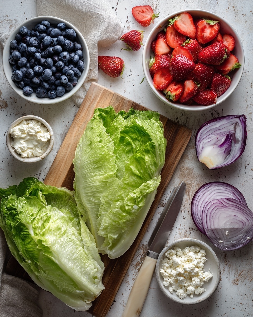 The image shows a white marbled surface with a wooden board holding fresh green lettuce leaves and a large, whole green lettuce in the lower part. To the left of the board, there is a white bowl filled with dark blue blueberries and above it, a larger white bowl full of sliced red strawberries. Next to the strawberries, a small white bowl contains thinly sliced light purple onions, and a halved purple onion sits to the right. Below the bowls, there is a small white bowl filled with white crumbled cheese and a dollop of white creamy spread nearby. A knife with a wooden handle lies on the wooden board near the lettuce. photo taken with an iphone --ar 4:5 --v 7