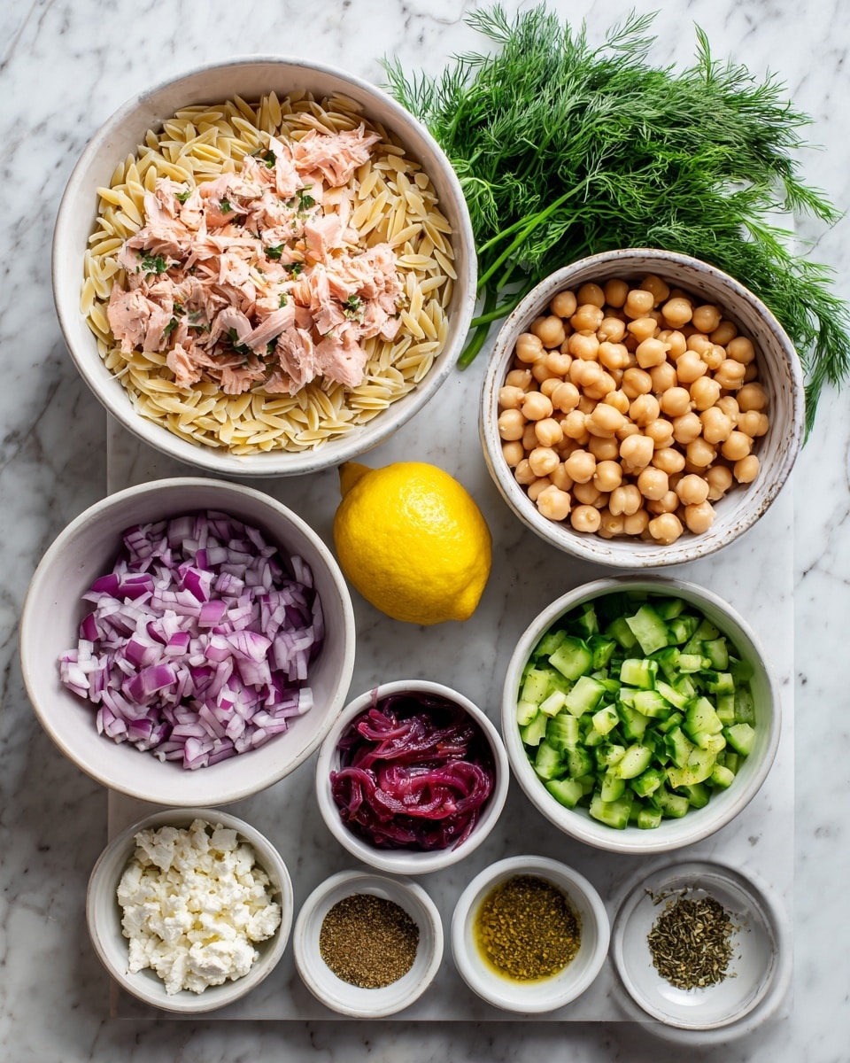 A top-down view of a baking tray holding several white bowls and a lemon, all placed on a white marbled surface. The largest bowl at the top contains light beige uncooked orzo pasta. Below to the left, a white bowl is filled with pinkish shredded cooked salmon with some green herbs. To the right, a smaller white bowl holds light brown chickpeas. Beside the orzo, a bunch of green parsley is on the tray left side, and green dill is on the right. Below the chickpeas, chopped bright green cucumber pieces fill a white bowl. Below the salmon, there is a white bowl with white crumbly cheese, and next to it at the bottom right, a white bowl contains chopped red roasted peppers. At the bottom center, a white bowl has purple chopped red onions, and to the bottom left, small white bowl sections hold beige mustard and different dried green spices. The bright yellow lemon sits in the center of the tray. photo taken with an iphone --ar 4:5 --v 7