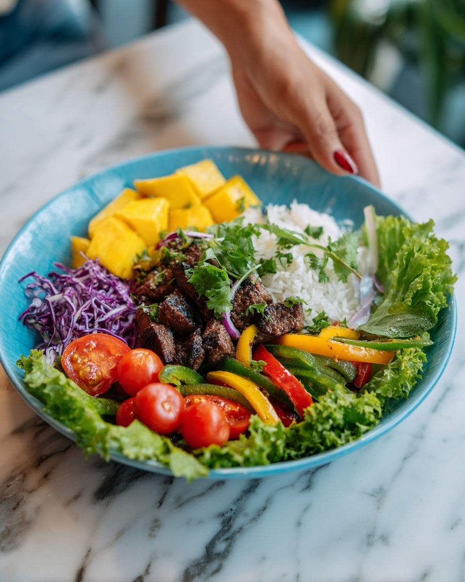 A white plate with a bright blue inside holds a colorful dish. The base is a mix of fresh green leafy lettuce spread evenly around the plate. On one side, there is a layer of white rice topped with slices of bright yellow mango. Around the rice and mango, there are grilled pieces of dark brown meat placed in the center, with slightly charred green and purple bell pepper strips and red onion rings scattered on top. Juicy red cherry tomatoes and slices of fresh red tomato add a vibrant touch around the meat and vegetables. Small sprigs of fresh green cilantro are sprinkled on the whole dish. The plate sits on a white marbled table with a woman's hand reaching towards the right side. Photo taken with an iphone --ar 4:5 --v 7