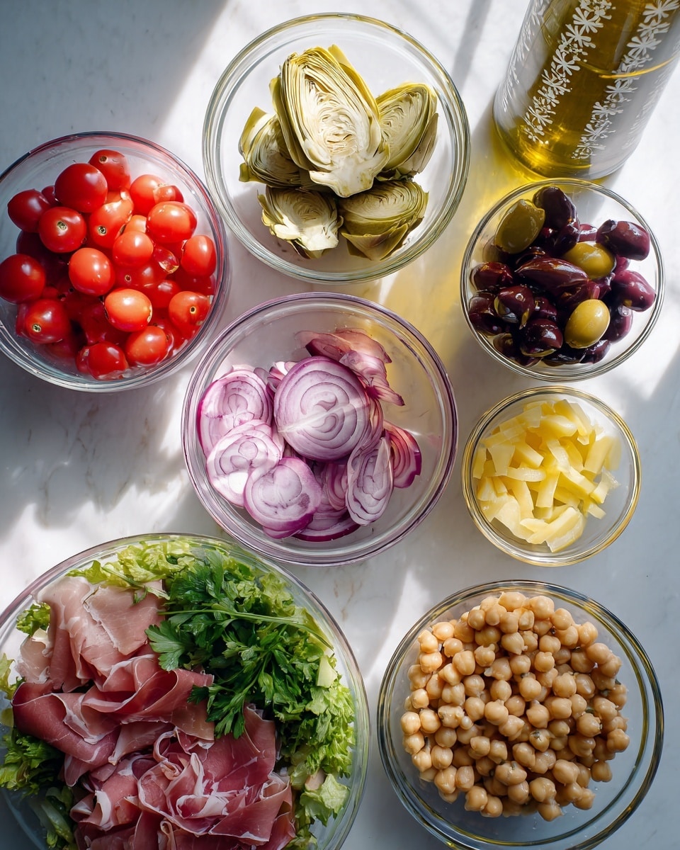 The image shows a white marbled surface with several clear glass bowls arranged neatly. Starting from the top left, there is a bowl filled with halved red cherry tomatoes, next to it a bowl with pale green artichoke hearts, and beside that a bowl with dark purple olives. Below, a bowl of thinly sliced red onions is placed next to a tall bottle of olive oil decorated with small white flower patterns. In the center, a larger bowl contains thinly sliced pink cured meat and light yellow cheese cubes. Below it, a small bowl holds yellow pepperoncini peppers. To the bottom right, another bowl is filled with beige chickpeas topped with some green herbs. At the bottom left of the frame, a large bowl contains shredded pink prosciutto and fresh green leafy lettuce with parsley on top. The scene is clean, bright, and organized, with a soft natural light highlighting the textures and colors of the ingredients. photo taken with an iphone --ar 4:5 --v 7