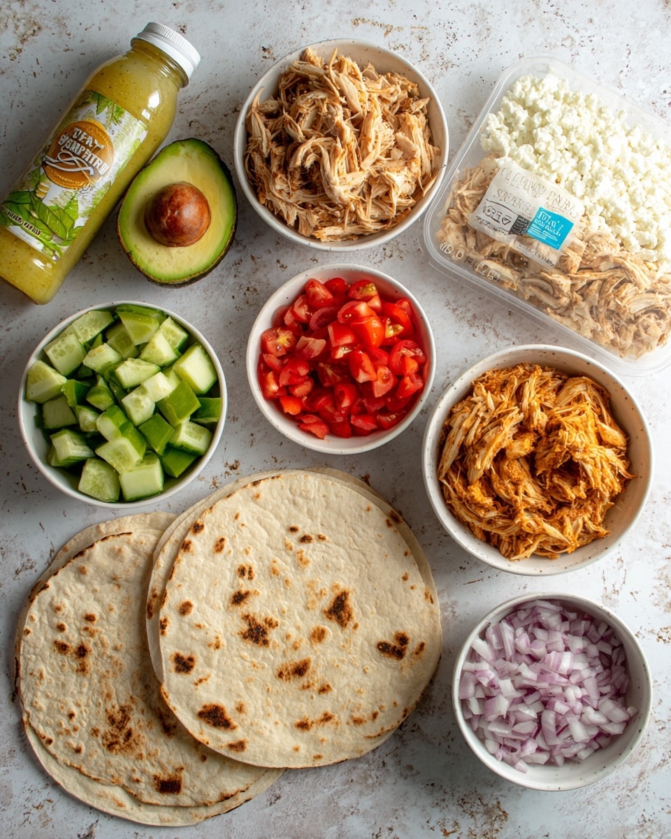 A collection of food items and ingredients arranged on a white marbled surface: two soft, round tortillas lie flat in the front, showing light brown spots; behind them, on the left side, a white bowl holds shredded cooked chicken; next to it, an avocado stands upright; beside the avocado, a small white bowl is filled with diced red tomatoes; another white bowl close by contains diced green cucumbers; next is a white bowl filled with a thick, orange spread; to the right, there is a small white bowl with chopped red onions; behind all these, a pack of ground chicken with a yellow and white label stands upright; to its right, a white container of feta crumbles is visible with a blue lid; finally, on the far left, a clear bottle of lemon basil dressing with a green and yellow label stands tall. The background is white marbled texture. Photo taken with an iphone --ar 4:5 --v 7