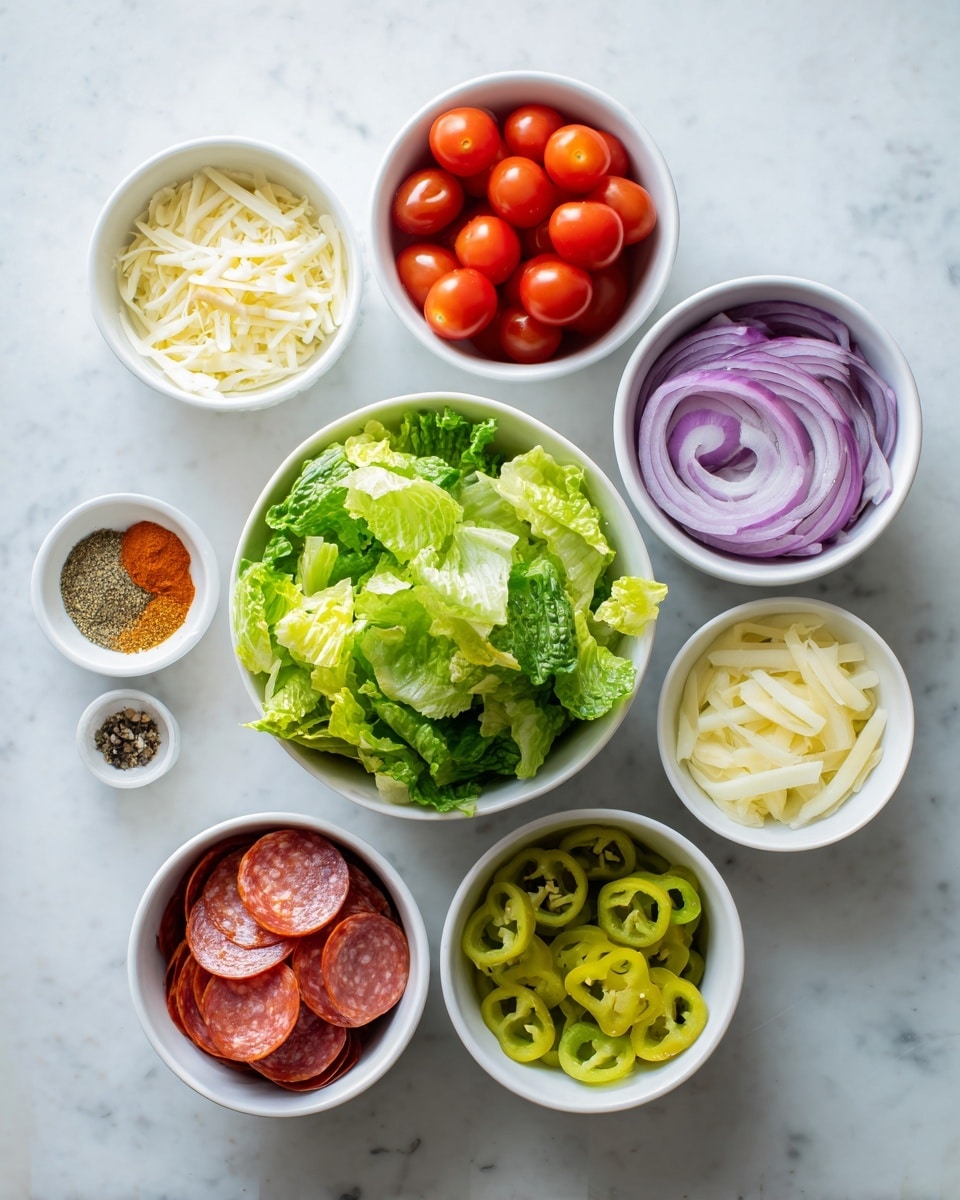 The image shows seven white bowls arranged on a white marbled surface; the largest bowl at the bottom is filled with fresh, bright green chopped lettuce with a crisp texture, while above it, six smaller bowls contain different ingredients: one bowl is full of shiny, whole red cherry tomatoes, another has thinly sliced purple onions, and a third holds pale yellow sliced cheese. One bowl contains a mix of dry spices in shades of white, orange, and black, next to a bowl with sliced red pepperoni and round slices of salami, and the last bowl is filled with light green sliced banana peppers. The overall look is fresh, colorful, and neatly organized, photo taken with an iphone --ar 4:5 --v 7