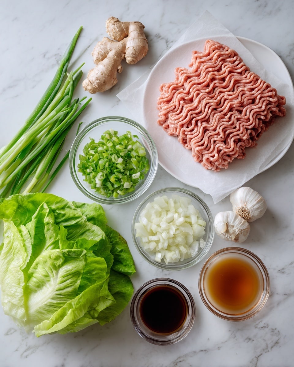 The image shows several cooking ingredients neatly arranged on a white marbled surface. There is a white plate at the top right corner holding a thick layer of light pink ground meat stacked in wavy lines on a piece of parchment paper. To the left, there are three small clear glass bowls: one with finely diced white onions, one with chopped green onions, and one with sliced fresh ginger and garlic cloves. At the bottom right corner, there are more small glass bowls holding a dark brown liquid sauce and a light amber liquid. A fresh whole head of bright green lettuce with soft, crinkled leaves occupies the bottom left corner. The colors contrast well against the white marble background, giving a fresh and clean look. photo taken with an iphone --ar 4:5 --v 7