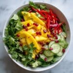 Refreshing Mango Salad with Lime Dressing and Crunchy Nuts Recipe