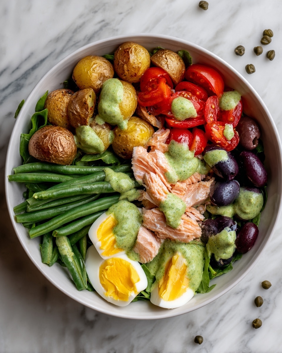 A white bowl filled with layers of fresh ingredients arranged in sections: on one side, roasted baby potatoes with a golden brown color topped with green sauce, next to bright red halved cherry tomatoes with dollops of green sauce, then a row of green beans placed neatly, beside them are pieces of cooked salmon with a light pink color and green sauce drizzled on top, dark purple olives clustered near the salmon, and two half pieces of boiled egg with yellow yolks and white edges, all set on a bed of green lettuce leaves. The bowl is placed on a white marbled surface with some capers scattered around. Photo taken with an iphone --ar 4:5 --v 7