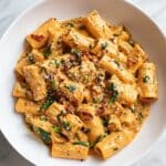 Sun-Dried Tomato Pasta with Creamy Parmesan and Fresh Basil Recipe