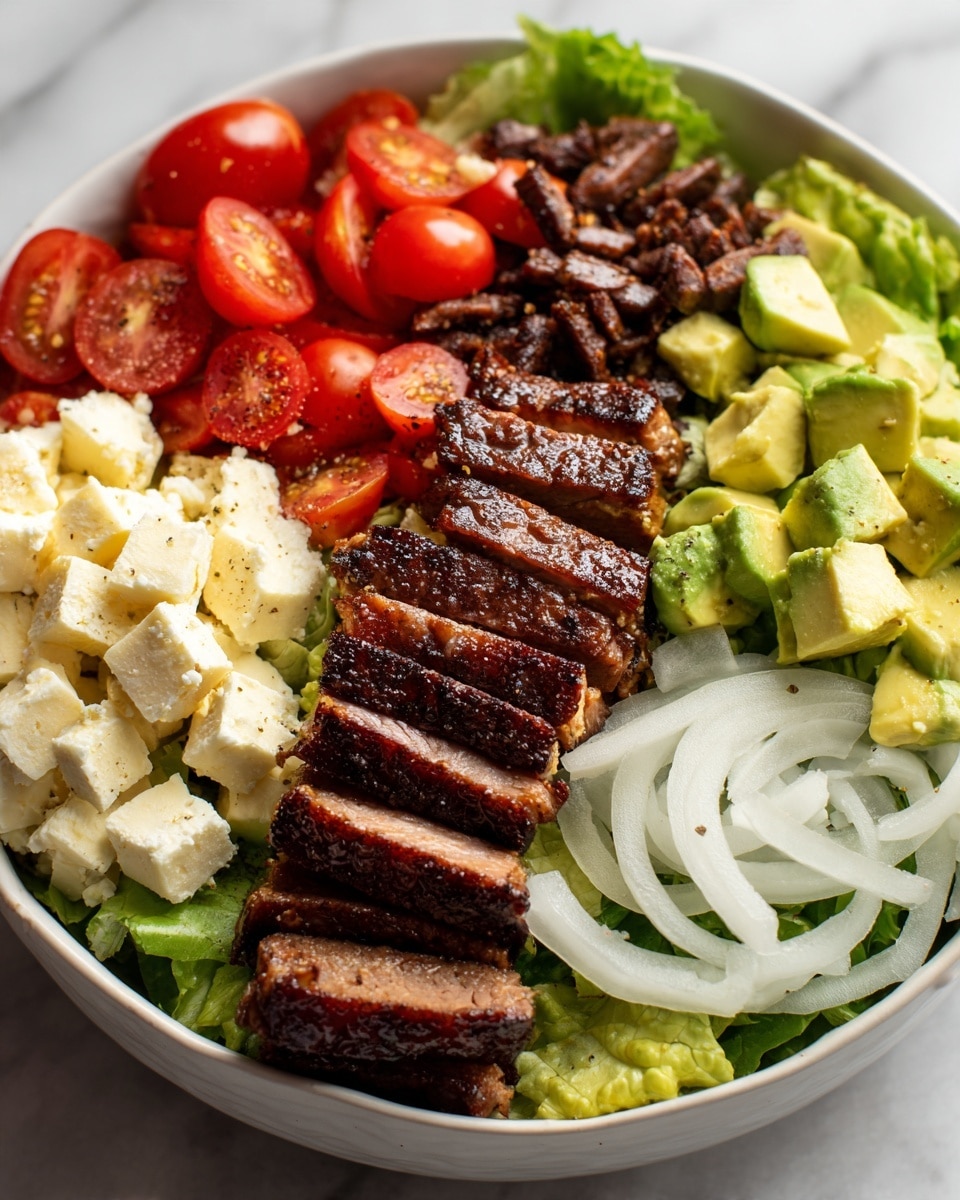 A white bowl filled with a salad showing five main layers: at the bottom is a bed of green leafy lettuce; next is a layer of diced light green avocado chunks to the right; above it are medium brown sliced pieces of seared textured meat arranged in a line; next to that is a pile of thin, dark brown crispy bits layered beside pale beige crumbles resembling soft cheese; and to the left are bright red cherry tomato halves with thinly sliced white onion strands scattered over the salad. The bowl sits on a white marbled textured surface. Photo taken with an iphone --ar 4:5 --v 7