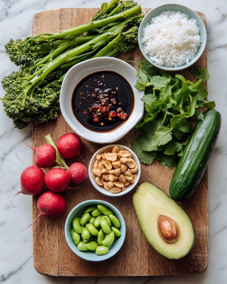 The image shows a wooden board with several ingredients neatly placed on it. On the top left, there are several stalks of green broccolini with textured florets. Next to the broccolini, a white bowl contains dark soy sauce mixed with red chili flakes and garlic pieces. To the right, a whole cucumber lies horizontally, and next to it is half an avocado with the seed still inside, showing its creamy green flesh. Below the soy sauce bowl, a small white bowl is filled with salted roasted peanuts. On the left side, a small white bowl holds bright green edamame beans. Four round, red radishes are scattered near the center, with fresh green mint and cilantro leaves beside them on the right. At the bottom left, a light blue bowl is full of fluffy white rice. The whole setup rests on a white marbled surface. Photo taken with an iphone --ar 4:5 --v 7
