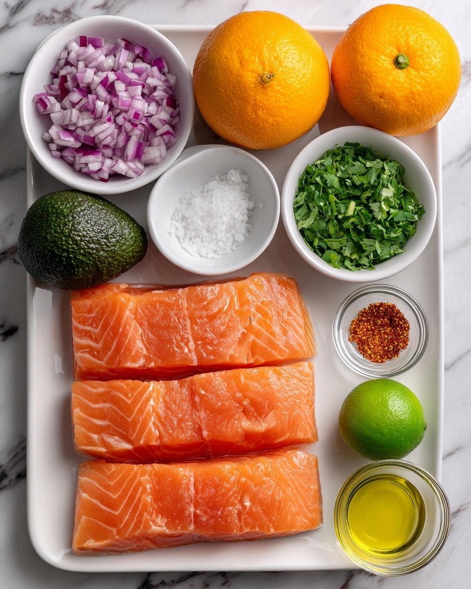 The image shows four thick, fresh salmon pieces placed side by side on a white rectangular plate at the bottom center. Above the salmon, there are three white round bowls arranged horizontally, filled with finely chopped red onions on the left, green chopped cilantro in the middle, and clear white salt on the right. Below these bowls, there is a whole dark green avocado on the left, a small glass bowl with reddish spice next to it, a small glass bowl with yellow olive oil beside the spice, and a whole green jalapeño pepper on the right. At the top, two whole bright orange oranges sit side by side, with one whole green lime to the right of the oranges. The background is a white marbled surface. photo taken with an iphone --ar 4:5 --v 7