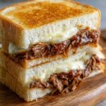 Cheesy Stuffed French Bread with Ground Beef and Marinara Recipe