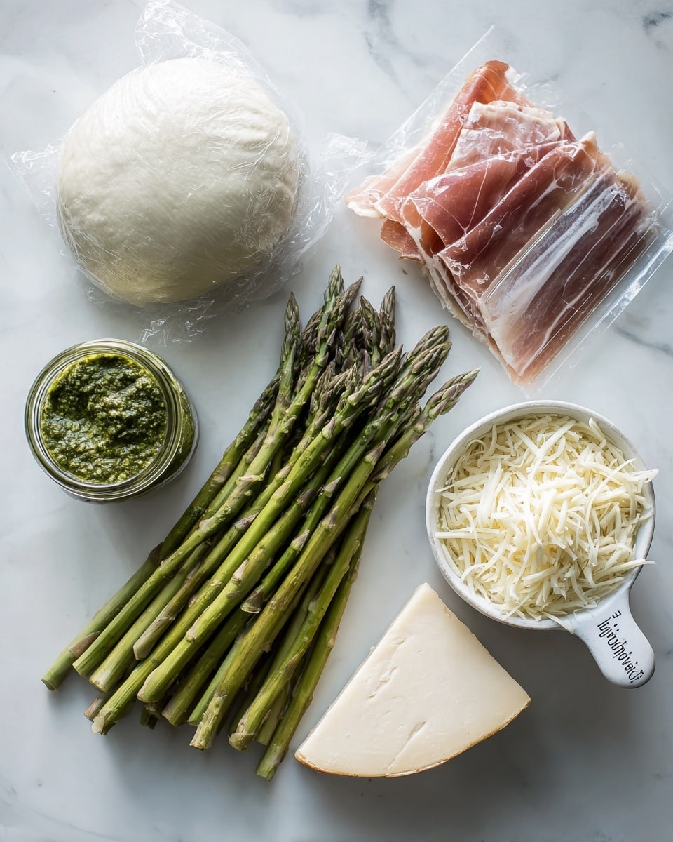 The image shows a white marbled surface with several ingredients neatly arranged: a ball of dough wrapped in clear plastic on the top left, a small jar of green pesto sauce below it, a pack of thinly sliced prosciutto placed diagonally beneath the pesto, a bunch of green asparagus spears aligned vertically in the center, a white measuring cup filled with shredded cheese on the top right, a triangular wedge of white cheese below the measuring cup, and a small white bowl holding flour or powder near the bottom right. The lighting is bright and clear, highlighting the fresh colors and textures of the ingredients, photo taken with an iphone --ar 4:5 --v 7